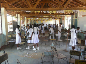 Cleaning up and preparing the classroom.